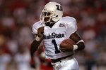 12 Sep 1998:  Tony Walker #1 of the Utah State Aggies in action during the game against the New Mexico Lobos at the University Stadium in Albuquerque, New Mexico. The Lobos defeated the Aggies 39-36.