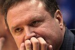 LAWRENCE, KS - DECEMBER 29:  Head coach Bill Self of the Kansas Jayhawks reacts from the bench during the game against the University of Texas Arlington Mavericks on December 29, 2010 at Allen Fieldhouse in Lawrence, Kansas.  (Photo by Jamie Squire/Getty Images)