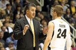 WEST LAFAYETTE, IN - JANUARY 09:  Matt Painter the Head Coach of the Purdue Boilermakers gives instructions to Ryne Smith #24 during the Big Ten Conference game against the Iowa Hawkeyes at Mackey Arena on January 9, 2011 in West Lafayette, Indiana.  Purdue won 75-52.  (Photo by Andy Lyons/Getty Images)