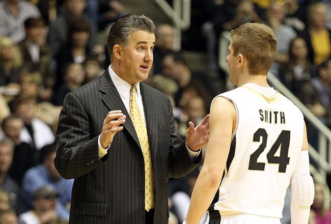 WEST LAFAYETTE, IN - JANUARY 09:  Matt Painter the Head Coach of the Purdue Boilermakers gives instructions to Ryne Smith #24 during the Big Ten Conference game against the Iowa Hawkeyes at Mackey Arena on January 9, 2011 in West Lafayette, Indiana.  Purdue won 75-52.  (Photo by Andy Lyons/Getty Images)