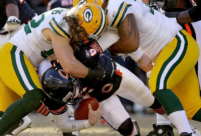 CHICAGO, IL - JANUARY 23:  Linebacker Clay Matthews #52 and Cullen Jenkins #77 of the Green Bay Packers sack quarterback Jay Cutler #6 of the Chicago Bears in the first half of the NFC Championship Game at Soldier Field on January 23, 2011 in Chicago, Illinois.  (Photo by Doug Pensinger/Getty Images)