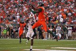MIAMI - NOVEMBER 20: Leonard Hankerson #85 of the Miami Hurricanes catches a touchdown over Davon Morgan #2 of the Virginia Tech Hokies at Sun Life Stadium on November 20, 2010 in Miami, Florida.  (Photo by Mike Ehrmann/Getty Images)