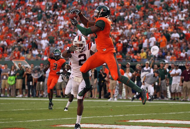 MIAMI - NOVEMBER 20: Leonard Hankerson #85 of the Miami Hurricanes catches a touchdown over Davon Morgan #2 of the Virginia Tech Hokies at Sun Life Stadium on November 20, 2010 in Miami, Florida.  (Photo by Mike Ehrmann/Getty Images)