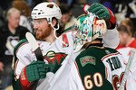 PITTSBURGH, PA - JANUARY 08:  Goaltender Jose Theodore #60 of the Minnesota Wild is congratulated by teammate Martin Havlat #24 after posting a 4-0 shutout win against the Pittsburgh Penguins on January 8, 2011 at CONSOL Energy Center in Pittsburgh, Pennsylvania.  (Photo by Jamie Sabau/Getty Images)