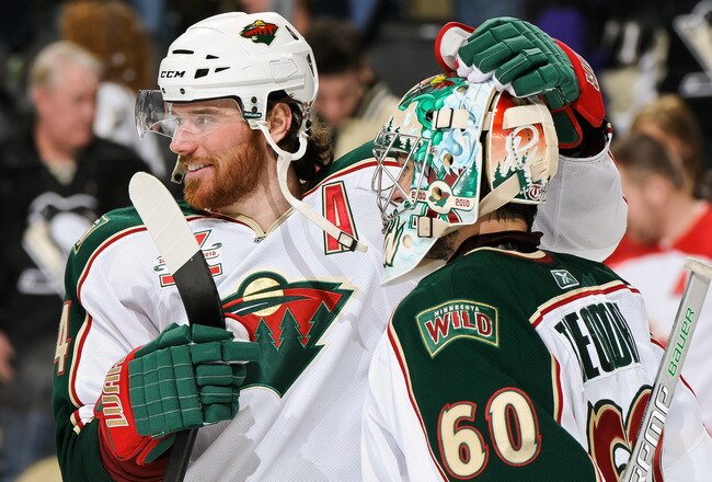 PITTSBURGH, PA - JANUARY 08:  Goaltender Jose Theodore #60 of the Minnesota Wild is congratulated by teammate Martin Havlat #24 after posting a 4-0 shutout win against the Pittsburgh Penguins on January 8, 2011 at CONSOL Energy Center in Pittsburgh, Pennsylvania.  (Photo by Jamie Sabau/Getty Images)