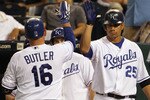 KANSAS CITY, MO - AUGUST 13:  Billy Butler #16 of the Kansas City Royals is congratulated by teammates after hitting a home run during the 5th inning of the game against the New York Yankees on August 13, 2010 at Kauffman Stadium in Kansas City, Missouri.  (Photo by Jamie Squire/Getty Images)