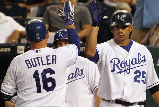 KANSAS CITY, MO - AUGUST 13:  Billy Butler #16 of the Kansas City Royals is congratulated by teammates after hitting a home run during the 5th inning of the game against the New York Yankees on August 13, 2010 at Kauffman Stadium in Kansas City, Missouri.  (Photo by Jamie Squire/Getty Images)