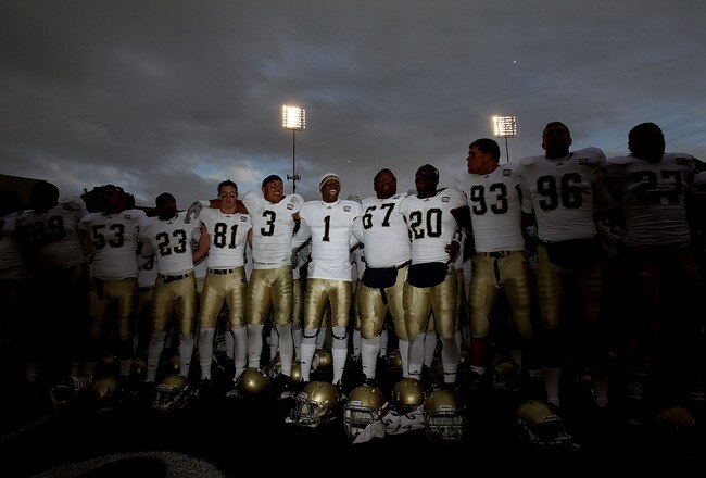 EL PASO, TX - DECEMBER 30:  The Notre Dame Fighting Irish celebrate a 33-17 win against the Miami Hurricanes at Sun Bowl on December 30, 2010 in El Paso, Texas.  (Photo by Ronald Martinez/Getty Images)