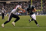PHILADELPHIA, PA - DECEMBER 02:  Owen Schmitt #32 of the Philadelphia Eagles scores a 5-yard touchdown reception in the fourth quarter against Brian Cushing #56 of the Houston Texans at Lincoln Financial Field on December 2, 2010 in Philadelphia, Pennsylvania.  (Photo by Al Bello/Getty Images)