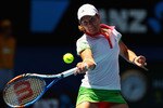 MELBOURNE, AUSTRALIA - JANUARY 21:  Justine Henin of Belgium plays a forehand in her third round match against Svetlana Kuznetsova of Russia during day five of the 2011 Australian Open at Melbourne Park on January 21, 2011 in Melbourne, Australia.  (Photo by Clive Brunskill/Getty Images)