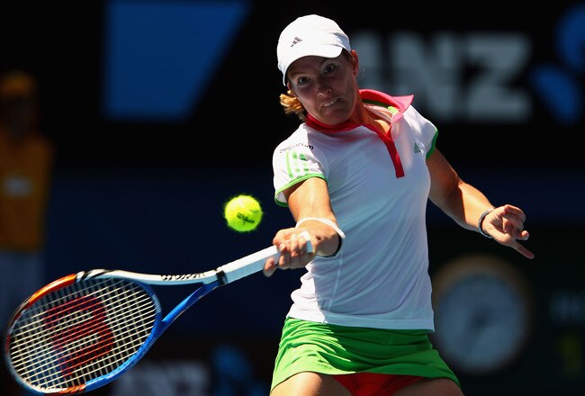 MELBOURNE, AUSTRALIA - JANUARY 21:  Justine Henin of Belgium plays a forehand in her third round match against Svetlana Kuznetsova of Russia during day five of the 2011 Australian Open at Melbourne Park on January 21, 2011 in Melbourne, Australia.  (Photo by Clive Brunskill/Getty Images)