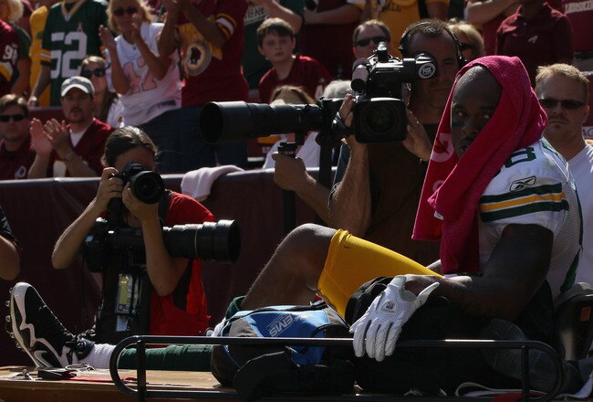 LANDOVER, MD - OCTOBER 10:  Tight end Jermichael Finley #88 of the Green Bay Packers leaves the game on a cart after injuring his knee against the Washington Redskins at FedExField on October 10, 2010 in Landover, Maryland. The Redskins won the game in overtime 16-13.  (Photo by Win McNamee/Getty Images)