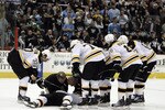 PITTSBURGH, PA - MARCH 07:  Marc Savard #91 of the Boston Bruins lies injured on the ice against the Pittsburgh Penguins in the third period at Mellon Arena on March 7, 2010 in Pittsburgh, Pennsylvania.  The Penguins defeated the Bruins 2-1.  (Photo by Justin K. Aller/Getty Images)