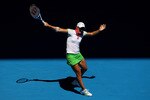 MELBOURNE, AUSTRALIA - JANUARY 21:  Justine Henin of Belgium plays a backhand in her third round match against Svetlana Kuznetsova of Russia during day five of the 2011 Australian Open at Melbourne Park on January 21, 2011 in Melbourne, Australia.  (Photo by Cameron Spencer/Getty Images)