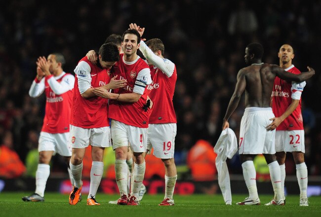 LONDON, ENGLAND - JANUARY 25:  Samir Nasri and Cesc Fabregas of Arsenal celebrate victory after the Carling Cup Semi Final Second Leg match between Arsenal and Ipswich Town at Emirates Stadium on January 25, 2011 in London, England.  (Photo by Shaun Botterill/Getty Images)