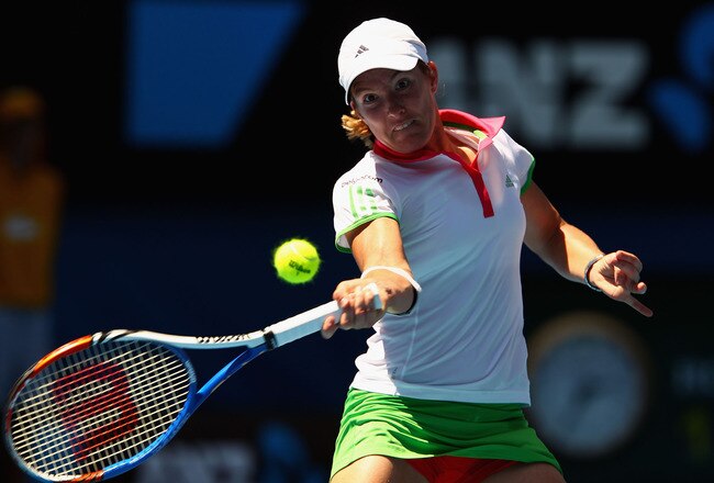 MELBOURNE, AUSTRALIA - JANUARY 21:  Justine Henin of Belgium plays a forehand in her third round match against Svetlana Kuznetsova of Russia during day five of the 2011 Australian Open at Melbourne Park on January 21, 2011 in Melbourne, Australia.  (Photo by Clive Brunskill/Getty Images)