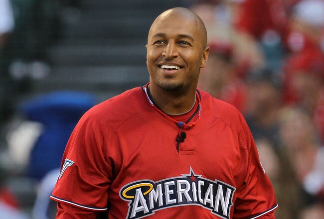 ANAHEIM, CA - JULY 12:  American League All-Star Vernon Wells #10 of the Toronto Blue Jays looks on during the frist round of the 2010 State Farm Home Run Derby during All-Star Weekend at Angel Stadium of Anaheim on July 12, 2010 in Anaheim, California.  (Photo by Stephen Dunn/Getty Images)