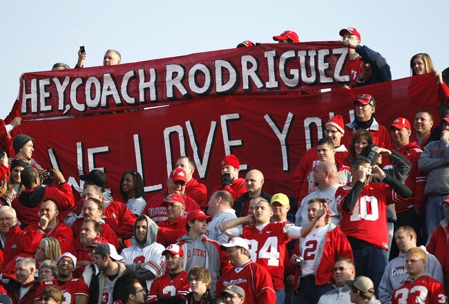 ANN ARBOR, MI - NOVEMBER 21: Fans of the Ohio State Buckeyes hold up a sign in support of head coach Rich Rodriguez of the Michigan Wolverines on November 21, 2009 at Michigan Stadium in Ann Arbor, Michigan. Ohio State won the game 21-10. (Photo by Gregory Shamus/Getty Images)