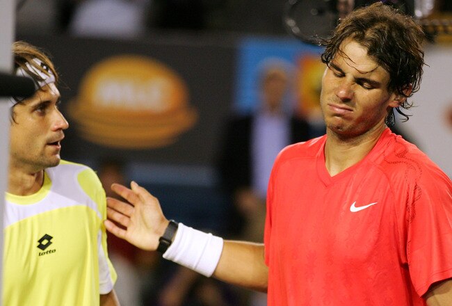 MELBOURNE, AUSTRALIA - JANUARY 26:  Rafael Nadal of Spain walks off court with David Ferrer of Spain in his victory in their quarterfinal match during day ten of the 2011 Australian Open at Melbourne Park on January 26, 2011 in Melbourne, Australia.  (Photo by Scott Barbour/Getty Images)