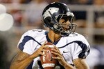 LAS VEGAS - OCTOBER 02:  Quarterback Colin Kaepernick #10 of the Nevada Reno Wolf Pack looks to pass against the  UNLV Rebels in the third quarter of their game at Sam Boyd Stadium October 2, 2010 in Las Vegas, Nevada. Nevada Reno won 44-26.  (Photo by Ethan Miller/Getty Images)