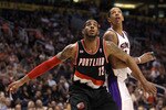 PHOENIX, AZ - JANUARY 14:  LaMarcus Aldridge #12 of the Portland Trail Blazers blocks out Channing Frye #8 of the Phoenix Suns during the NBA game at US Airways Center on January 14, 2011 in Phoenix, Arizona.  The Suns defeated the Trail Blazers 115-111.  NOTE TO USER: User expressly acknowledges and agrees that, by downloading and or using this photograph, User is consenting to the terms and conditions of the Getty Images License Agreement.  (Photo by Christian Petersen/Getty Images)