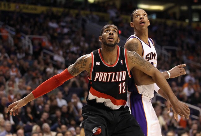 PHOENIX, AZ - JANUARY 14:  LaMarcus Aldridge #12 of the Portland Trail Blazers blocks out Channing Frye #8 of the Phoenix Suns during the NBA game at US Airways Center on January 14, 2011 in Phoenix, Arizona.  The Suns defeated the Trail Blazers 115-111.  NOTE TO USER: User expressly acknowledges and agrees that, by downloading and or using this photograph, User is consenting to the terms and conditions of the Getty Images License Agreement.  (Photo by Christian Petersen/Getty Images)