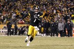 PITTSBURGH, PA - JANUARY 23:  Ben Roethlisberger #7 of the Pittsburgh Steelers runs for a second quarter touchdown against the New York Jets during the 2011 AFC Championship game at Heinz Field on January 23, 2011 in Pittsburgh, Pennsylvania.  (Photo by Al Bello/Getty Images)