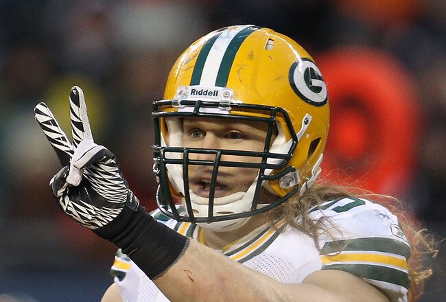 CHICAGO, IL - JANUARY 23:  Linebacker Clay Matthews #52 of the Green Bay Packers holds up two fingers against the Chicago Bears in the NFC Championship Game at Soldier Field on January 23, 2011 in Chicago, Illinois.  (Photo by Jonathan Daniel/Getty Images)