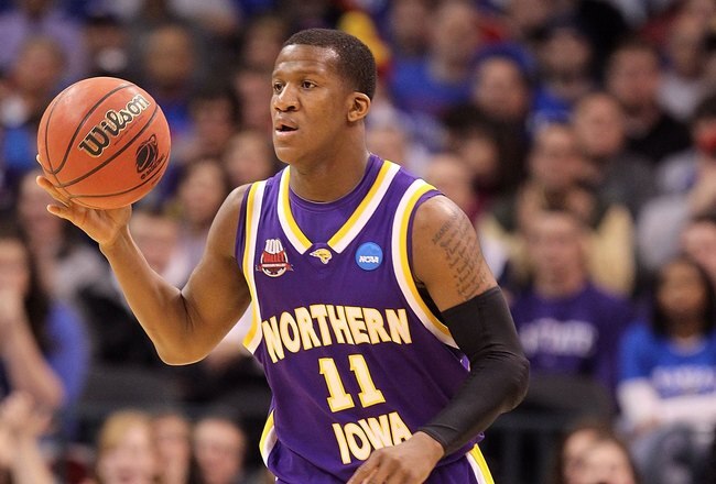 OKLAHOMA CITY - MARCH 20:  Kwadzo Ahelegbe #11 of the Northern Iowa Panthers brings the ball up court against the Kansas Jayhawks during the second round of the 2010 NCAA men's basketball tournament at Ford Center on March 20, 2010 in Oklahoma City, Oklahoma.  (Photo by Ronald Martinez/Getty Images)