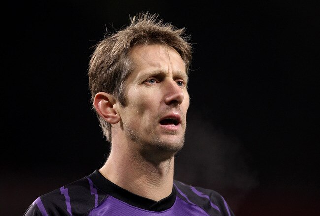 MANCHESTER, ENGLAND - DECEMBER 13:  Edwin van der Sar of Manchester United  looks on during the Barclays Premier League match between Manchester United and Arsenal at Old Trafford on December 13, 2010 in Manchester, England.  (Photo by Alex Livesey/Getty Images)