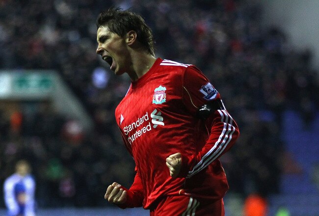 WIGAN, ENGLAND - NOVEMBER 10:  Fernando Torres  of Liverpool celebrates after scoring the first goal during the Barclays Premier League match between Wigan Athletic and Liverpool at DW Stadium on November 10, 2010 in Wigan, England.  (Photo by Clive Brunskill/Getty Images)