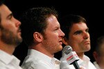 CONCORD, NC - JANUARY 26:  Dale Earnhardt Jr. (2L), driver of the #88 AMP Energy Chevrolet, speaks to the media during the NASCAR Sprint Media Tour hosted by Charlotte Motor Speedway, held at Hendrick Motorsports on January 26, 2011 in Concord, North Carolina.  (Photo by Jason Smith/Getty Images for NASCAR)
