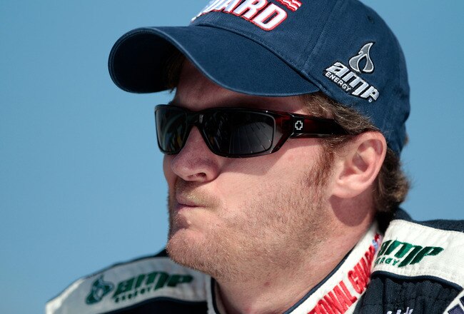 HOMESTEAD, FL - NOVEMBER 21:  Dale Earnhardt Jr., driver of the #88 National Guard/AMP Energy Chevrolet, stands on pit road prior to the NASCAR Sprint Cup Series Ford 400 at Homestead-Miami Speedway on November 21, 2010 in Homestead, Florida.  (Photo by Chris Graythen/Getty Images)
