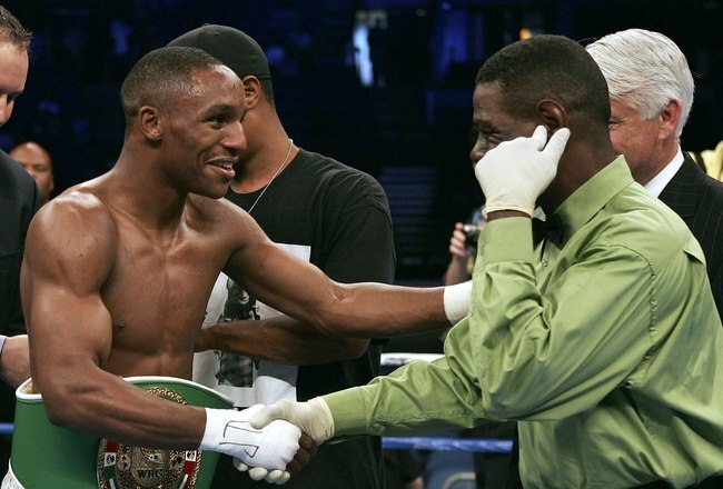 ST. LOUIS - JULY 8:  Devon Alexander (L) shakes hands with referee Tim Adams after Alexander defeated Tyler Ziolkowski by TKO in the first round on July 8, 2006 at the Savvis Center in St. Louis, Missouri.  (Photo by Elsa/Getty Images)