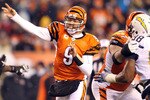 CINCINNATI - DECEMBER 26:  Carson Palmer #9 of the Cincinnati Bengals throws a pass during the NFL game against the San Diego Chargers at Paul Brown Stadium on December 26, 2010 in Cincinnati, Ohio. The Bengals 34-20.  (Photo by Andy Lyons/Getty Images)