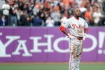 SAN FRANCISCO - OCTOBER 20:  Jimmy Rollins #11 of the Philadelphia Phillies stands at second base after being tagged out during Game Four of the NLCS against the San Francisco Giants in the 2010 MLB Playoffs at AT&T Park on October 20, 2010 in San Francisco, California.  (Photo by Harry How/Getty Images)