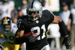OAKLAND, CA - OCTOBER 29:  Nnamdi Asomugha #21 of the Oakland Raiders runs with the ball on an interception for a touchdown against the Pittsburgh Steelers on October 29, 2006 at McAfee Coliseum in Oakland, California.  (Photo by Robert Laberge/Getty Images)