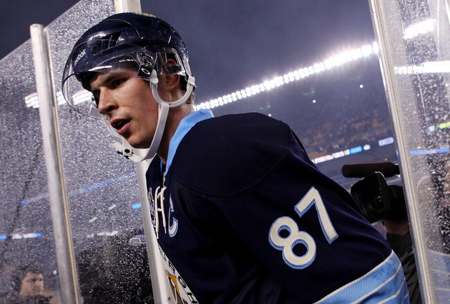 PITTSBURGH, PA - JANUARY 01:  Sidney Crosby #87 of the Pittsburgh Penguins walks off the ice after being defeated 3-1 by the Washington Capitals during the 2011 NHL Bridgestone Winter Classic at Heinz Field on January 1, 2011 in Pittsburgh, Pennsylvania.  (Photo by Jamie Squire/Getty Images)