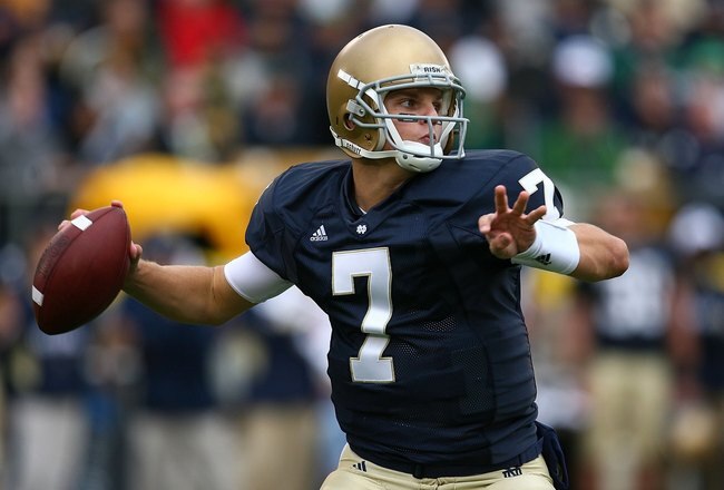 SOUTH BEND, IN - OCTOBER 03: Jimmy Clausen #7 of the Notre Dame Fighting Irish passes the ball against the Washington Huskies on October 3, 2009 at Notre Dame Stadium in South Bend, Indiana. Notre Dame defeated Washington 37-30 in overtime. (Photo by Jonathan Daniel/Getty Images)