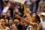 HARTFORD, CT - DECEMBER 21:  Maya Moore #23 of the Connecticut celebrates in the final minutes of a win over Florida State on December 21, 2010 in Hartford, Connecticut.  Connecticut set a record with 89 straight wins without a defeat. (Photo by Jim Rogash/Getty Images)