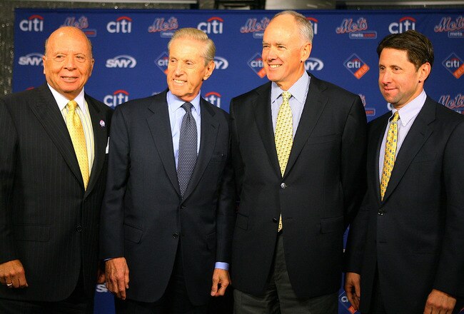 NEW YORK - OCTOBER 29:  (L - R) Saul Katz, CEO of the Mets, Fred Wilpon, president of the Mets, Sandy Alderson and Jeff Wilpon, chief operating officer of the Mets pose for a photo during Alderson's introduction as the general manager for the New York Mets on October 29, 2010 at Citi Field in the Flushing neighborhood of the Queens borough of New York City. (Photo by Andrew Burton/Getty Images)