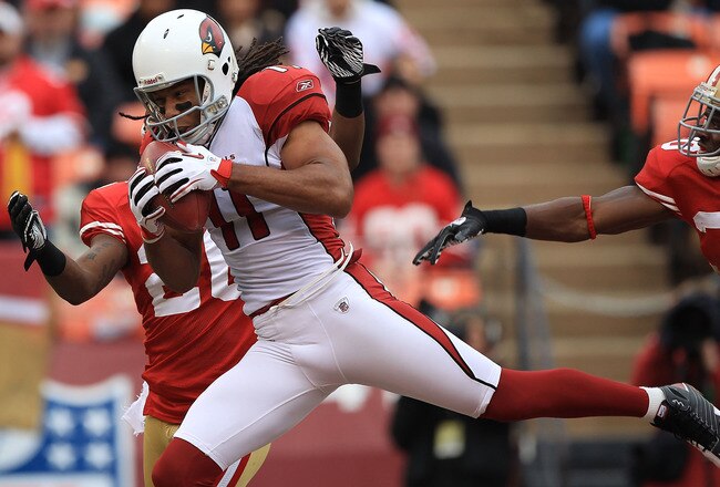 SAN FRANCISCO, CA - JANUARY 2:  Larry Fitzgerald #11 of the Arizona Cardinals catches a touchdown against the San Francisco 49er during an NFL game at Candlestick Park on January 2, 2011 in San Francisco, California.(Photo by Jed Jacobsohn/Getty Images)