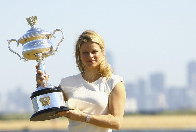 MELBOURNE, AUSTRALIA - JANUARY 30:  Kim Clijsters of Belgium poses with the Daphne Akhurst Trophy after winning the 2011 Women's Australian Open final, at Brighton Beach on January 30, 2011 in Melbourne, Australia.  (Photo by Robert Prezioso/Getty Images)