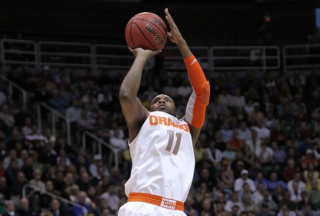 SALT LAKE CITY - MARCH 25:  Scoop Jardine #11 of the Syracuse Orange in action against the Butler Bulldogs during the west regional semifinal of the 2010 NCAA men's basketball tournament at the Energy Solutions Arena on March 25, 2010 in Salt Lake City, Utah.  (Photo by Jed Jacobsohn/Getty Images)