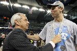 DETROIT - APRIL 06:  (L-R) Head coach Roy Williams and Tyler Hansbrough #50 of the North Carolina Tar Heels celebrate after they won 89-72 against the Michigan State Spartans during the 2009 NCAA Division I Men's Basketball National Championship game at Ford Field on April 6, 2009 in Detroit, Michigan.  (Photo by Andy Lyons/Getty Images)