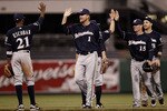 PITTSBURGH - APRIL 20: Alcides Escobar #21, Corey Hart #1, Jim Edmonds #15, and Ryan Braun #8 of the Milwaukee Brewers congratulate each other after beating of the Pittsburgh Pirates 8-1 on April 20, 2010 at PNC Park in Pittsburgh, Pennsylvania.  (Photo by Jared Wickerham/Getty Images)