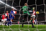 LONDON, ENGLAND - FEBRUARY 01:  Laurent Koscielny of Arsenal (R) beats Tim Howard of Everton to score their second goal during the Barclays Premier League match between Arsenal and Everton at the Emirates Stadium on February 1, 2011 in London, England.  (Photo by Mike Hewitt/Getty Images)
