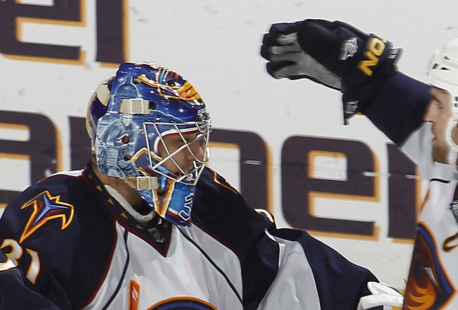 SUNRISE, FL - JANUARY 17: Goaltender Ondrej Pavelec #31 is congratulated by Andrew Ladd #16 of the Atlanta Thrashers after they defeated the Florida Panthers 3-2 in a shoot out on January 17, 2011 at the BankAtlantic Center in Sunrise, Florida. (Photo by Joel Auerbach/Getty Images)