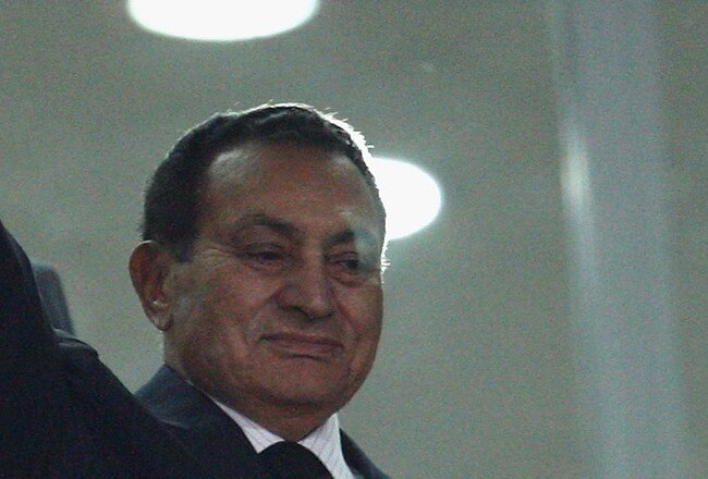 NEW YORK - AUGUST 30:  President of Egypt Hosni Mubarak waves during the Group A, FIFA U20 World Cup match between Egypt and Trinidad & Tobago on September 24, 2009 in Alexandria, Egypt.  (Photo by Julian Finney/Getty Images)