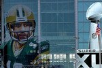 ARLINGTON, TX - JANUARY 27:  An image of Aaron Rodgers of the Green Bay Packers outside of Cowboys Stadium on January27, 2011 in Arlington, Texas.  Cowboys Stadium will host Super Bowl XLV on February 6, 2011 between the Pittsburgh Steelers and the Green Bay Packers in Dallas, Texas.  (Photo by Ronald Martinez/Getty Images)